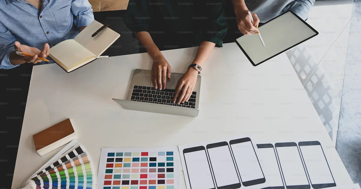 Top view image of graphic designing team working together and ...
