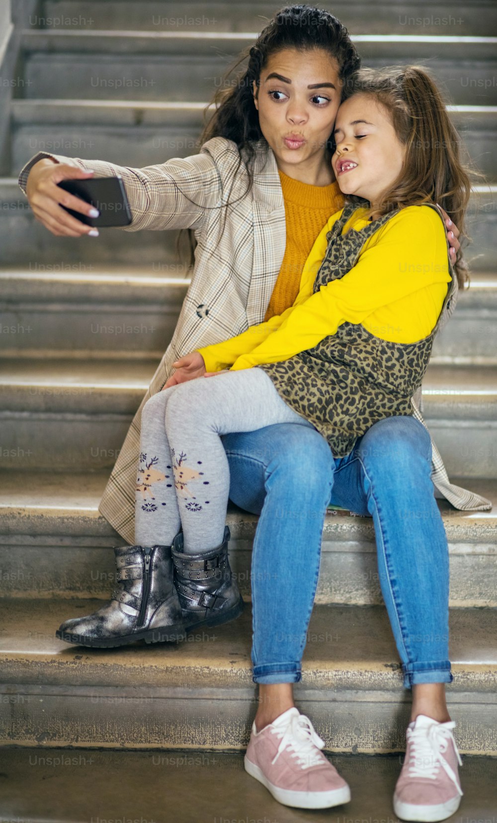 Make the memories. African American mother with her daughter.