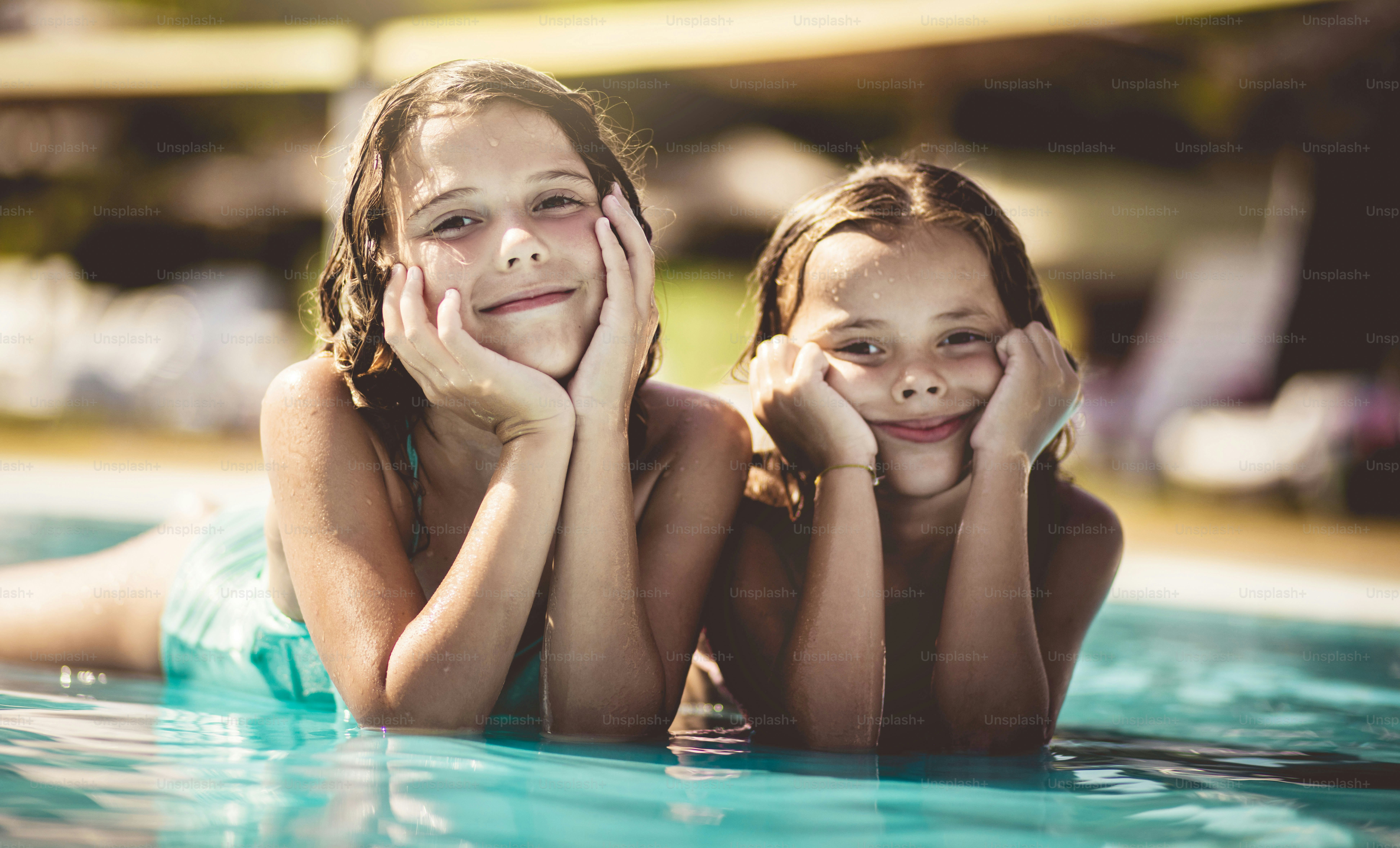 Summer  started. Children in pool.