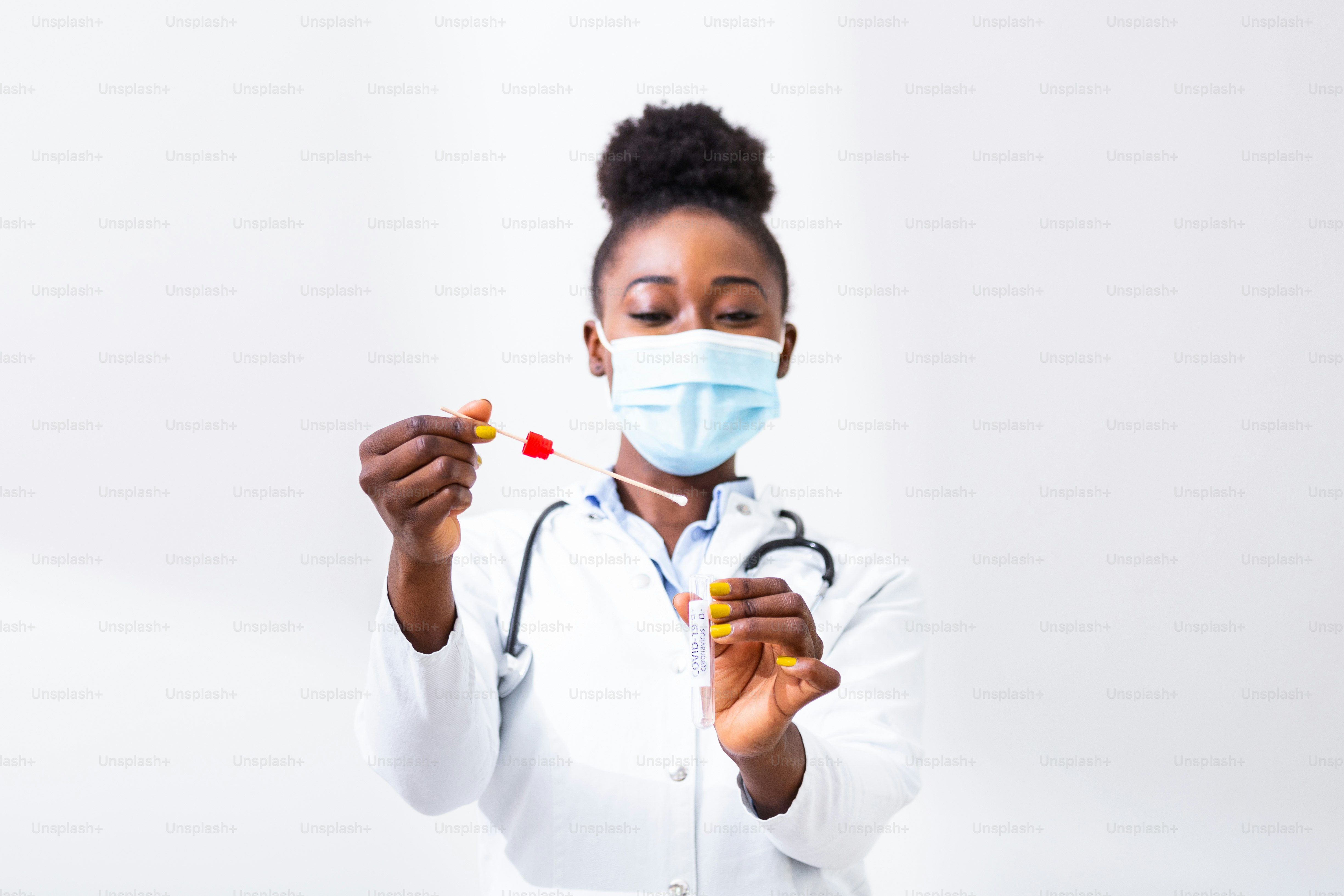 Medical healthcare holding COVID-19 , Coronavirus swab collection kit, wearing protective mask , test tube for taking OP NP patient specimen sample,PCR DNA testing protocol process