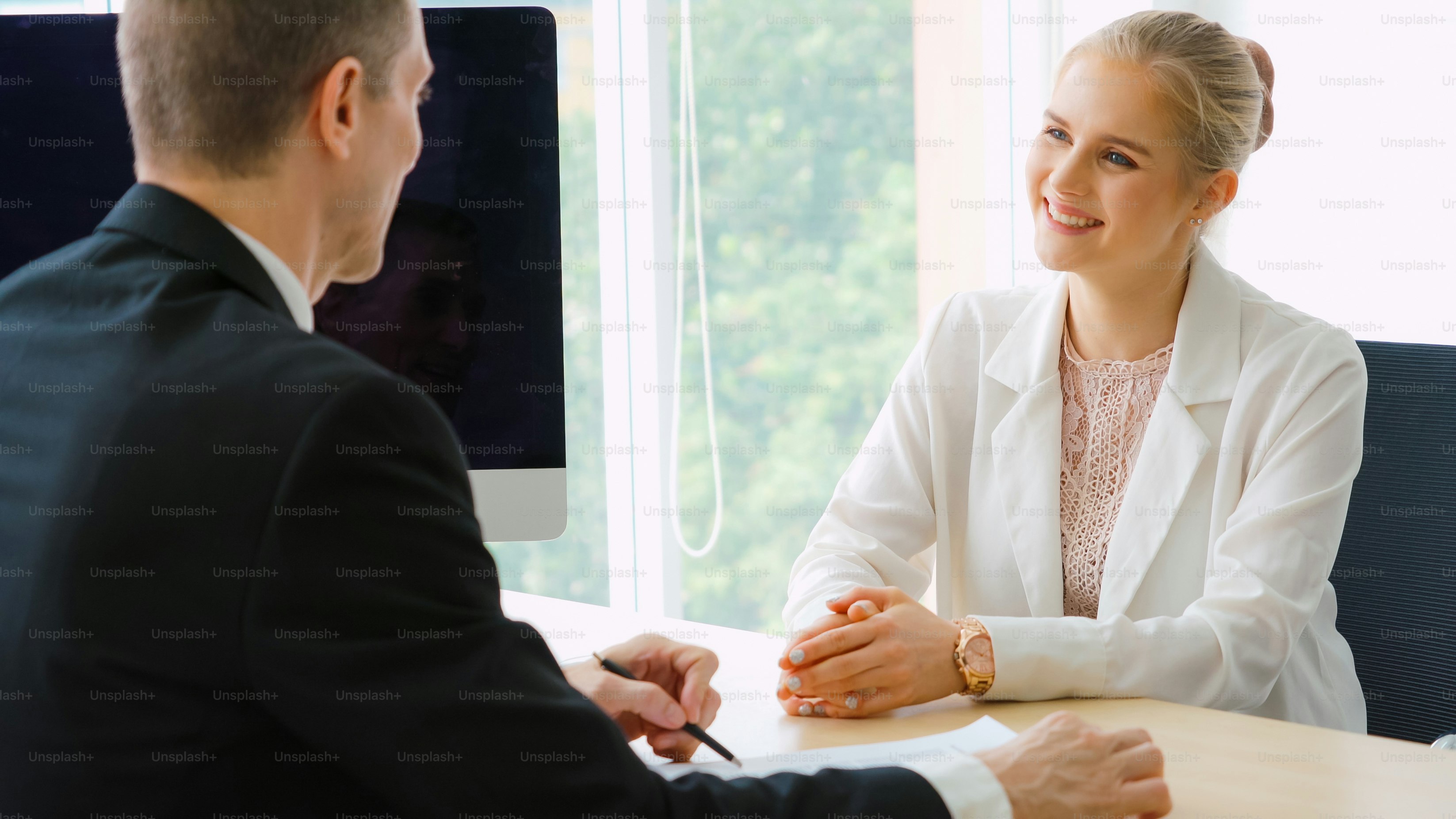 Job seeker in job interview meeting with manager and interviewer at corporate office. The young interviewee seeking for a professional career job opportunity . Human resources and recruitment concept.