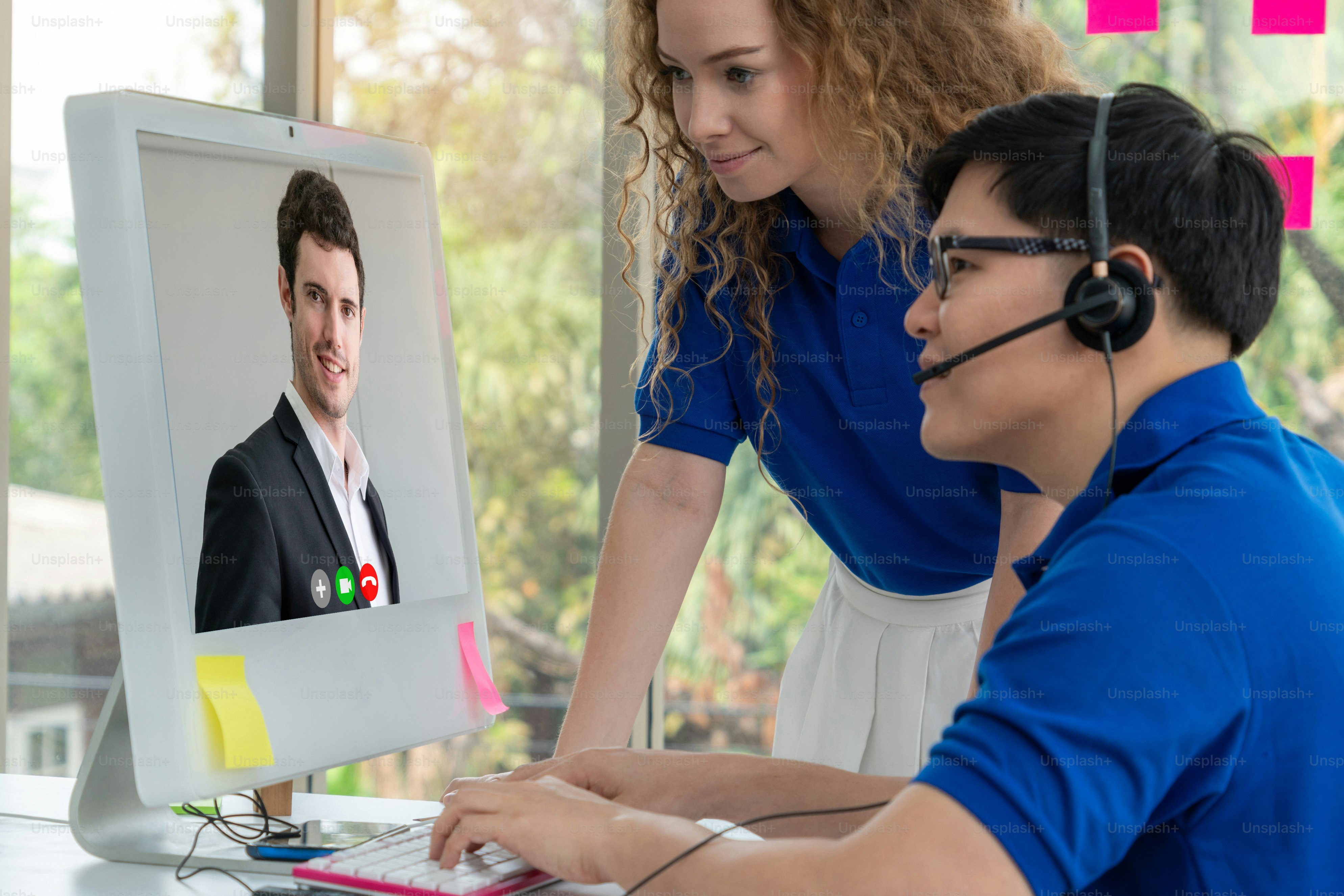 Video call group business people meeting on virtual workplace or remote office. Telework conference call using smart video technology to communicate colleague in professional corporate business.