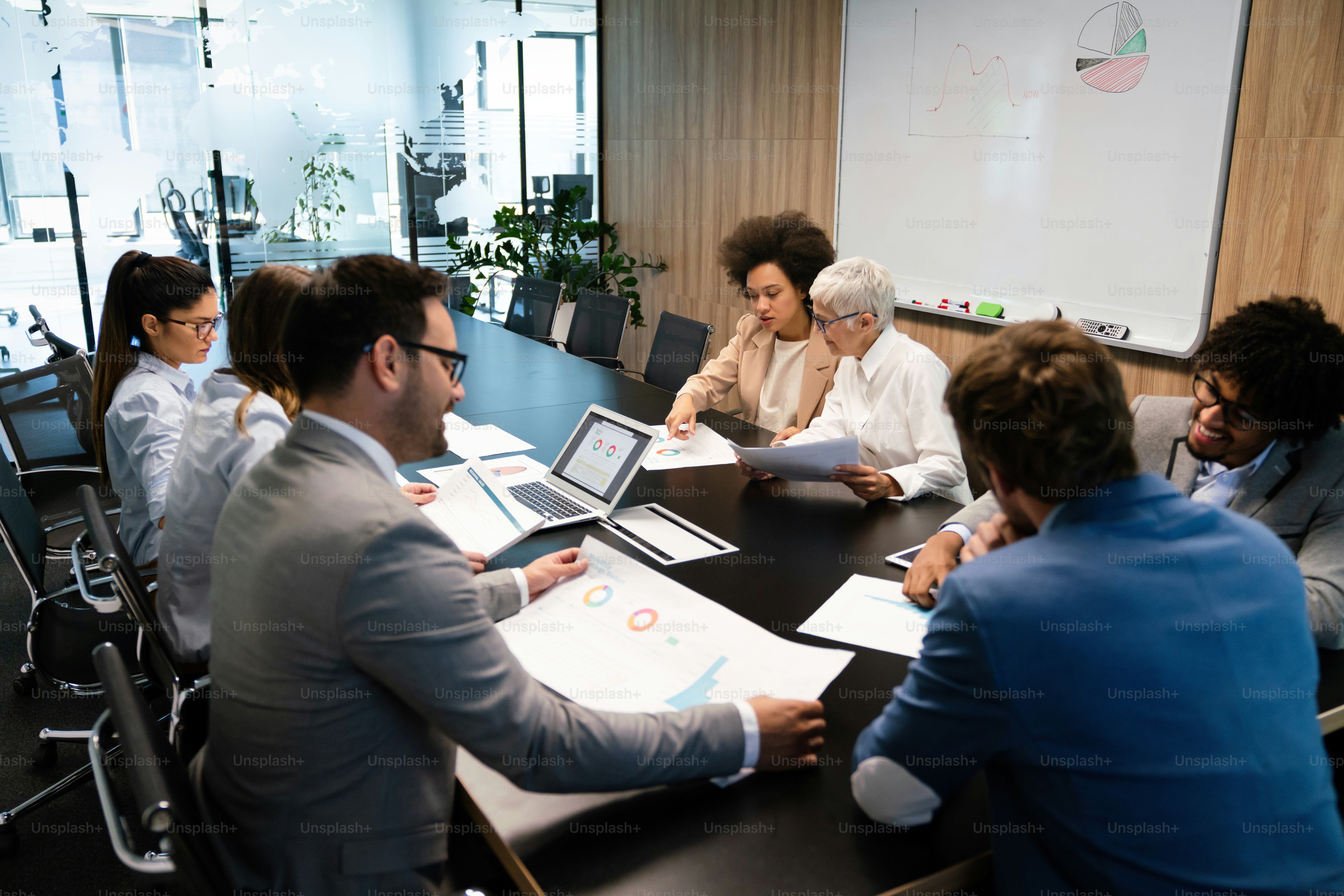 Group of diverse business people working at busy modern office