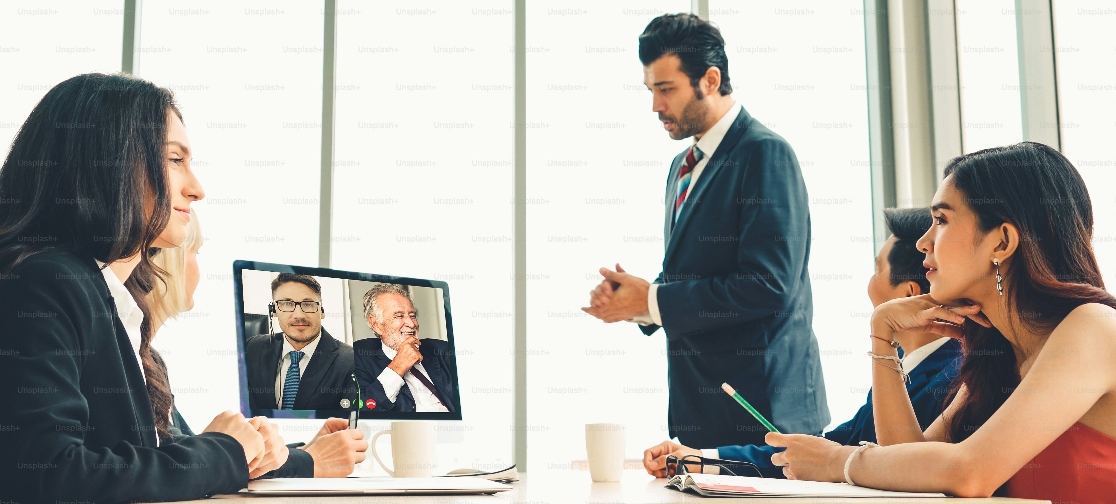 business-meeting-with-video-conference-photo-on-unsplash