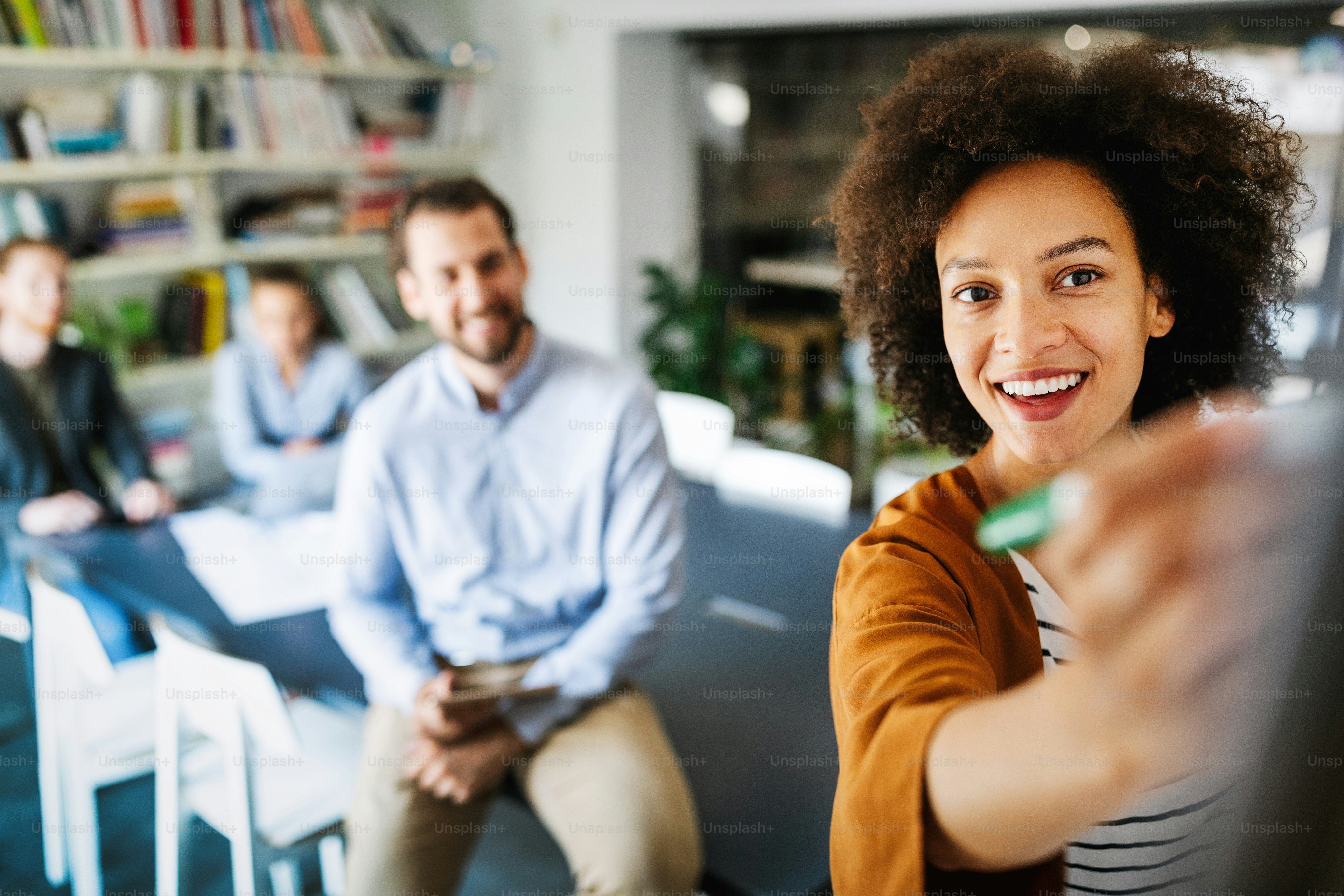 Businesspeople discussing together in conference room meeting at office