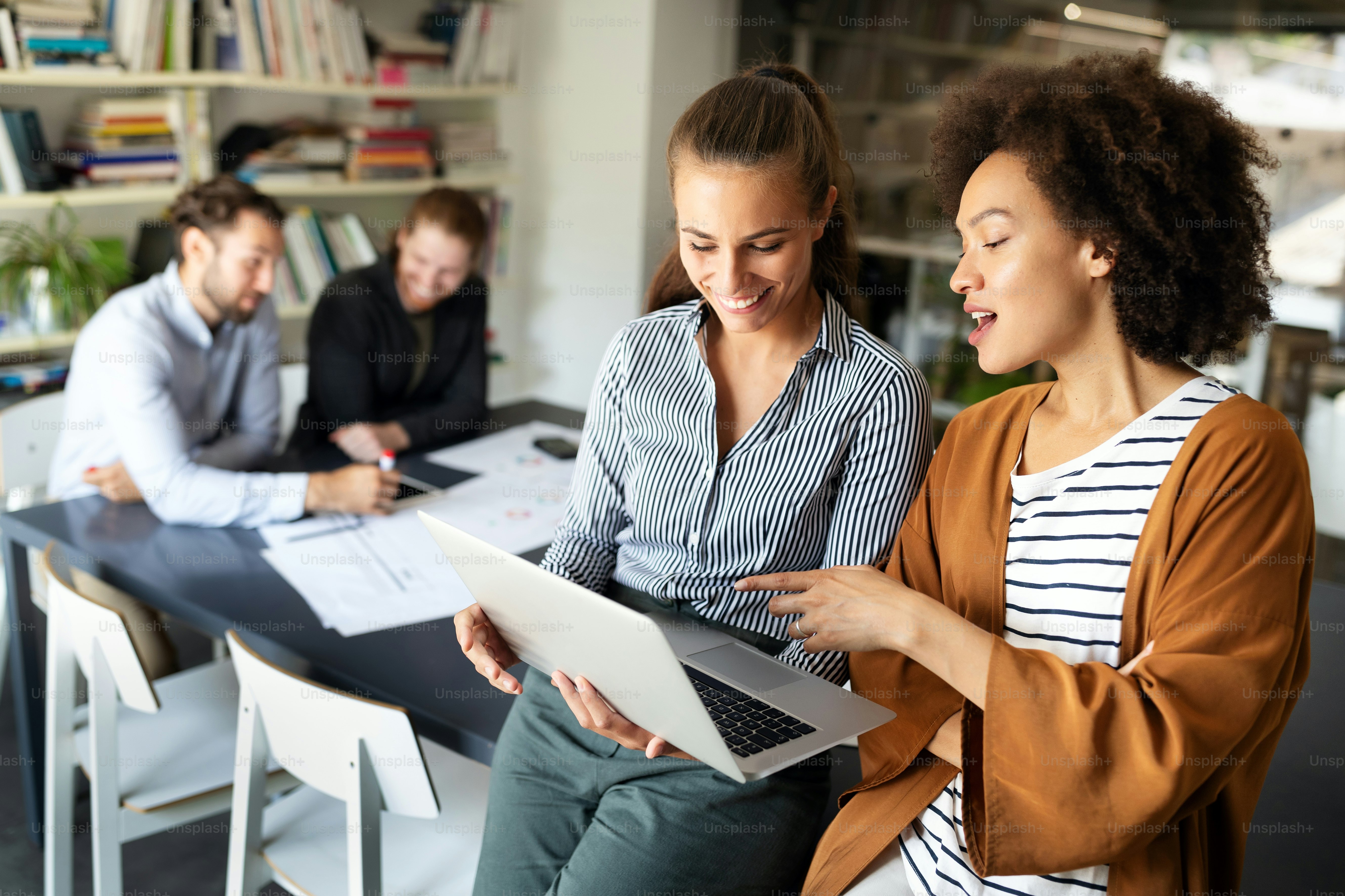 Businesspeople discussing together in conference room meeting at office