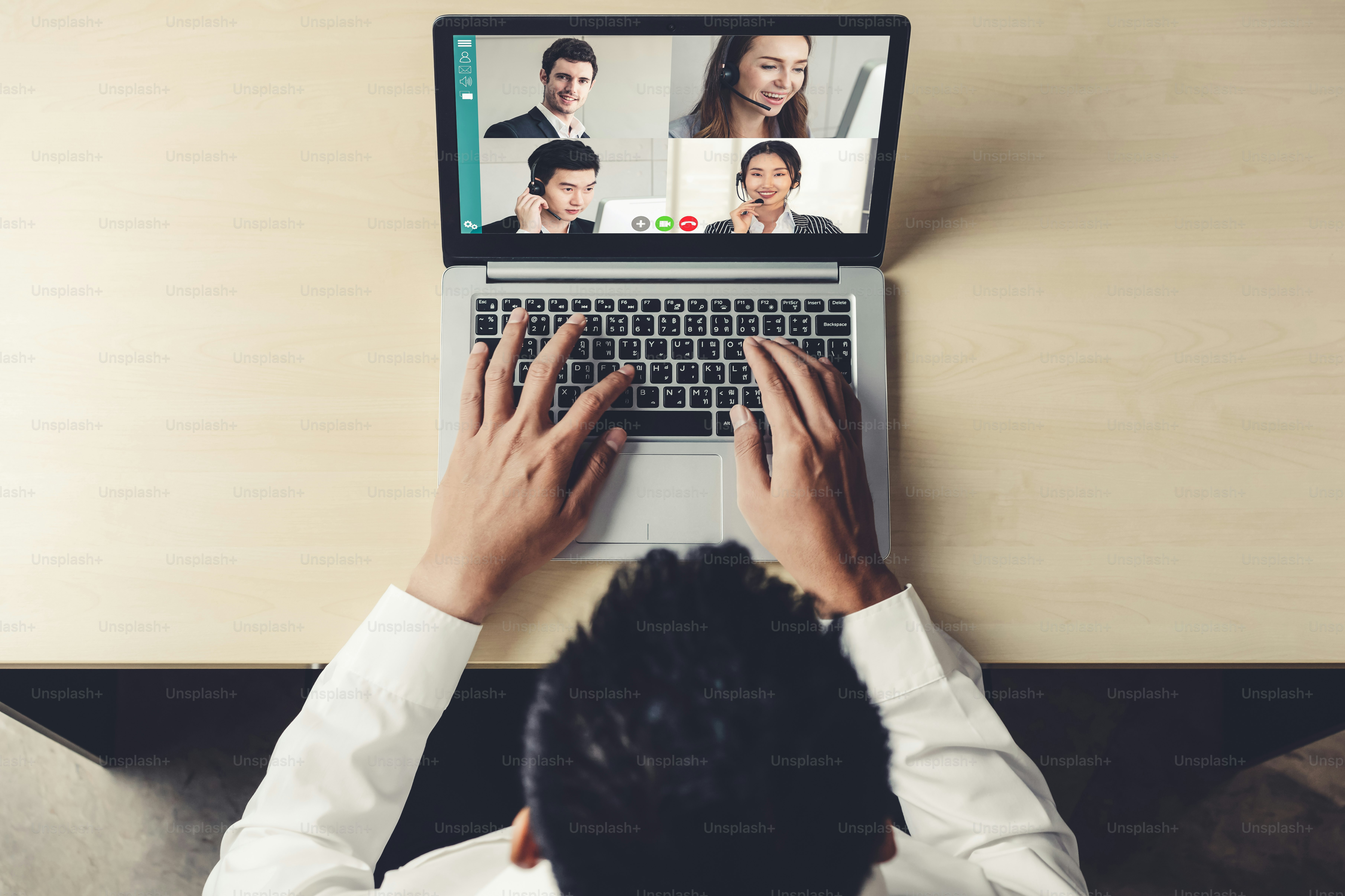 Video call business people meeting on virtual workplace or remote office. Telework conference call using smart video technology to communicate colleague in professional corporate business.