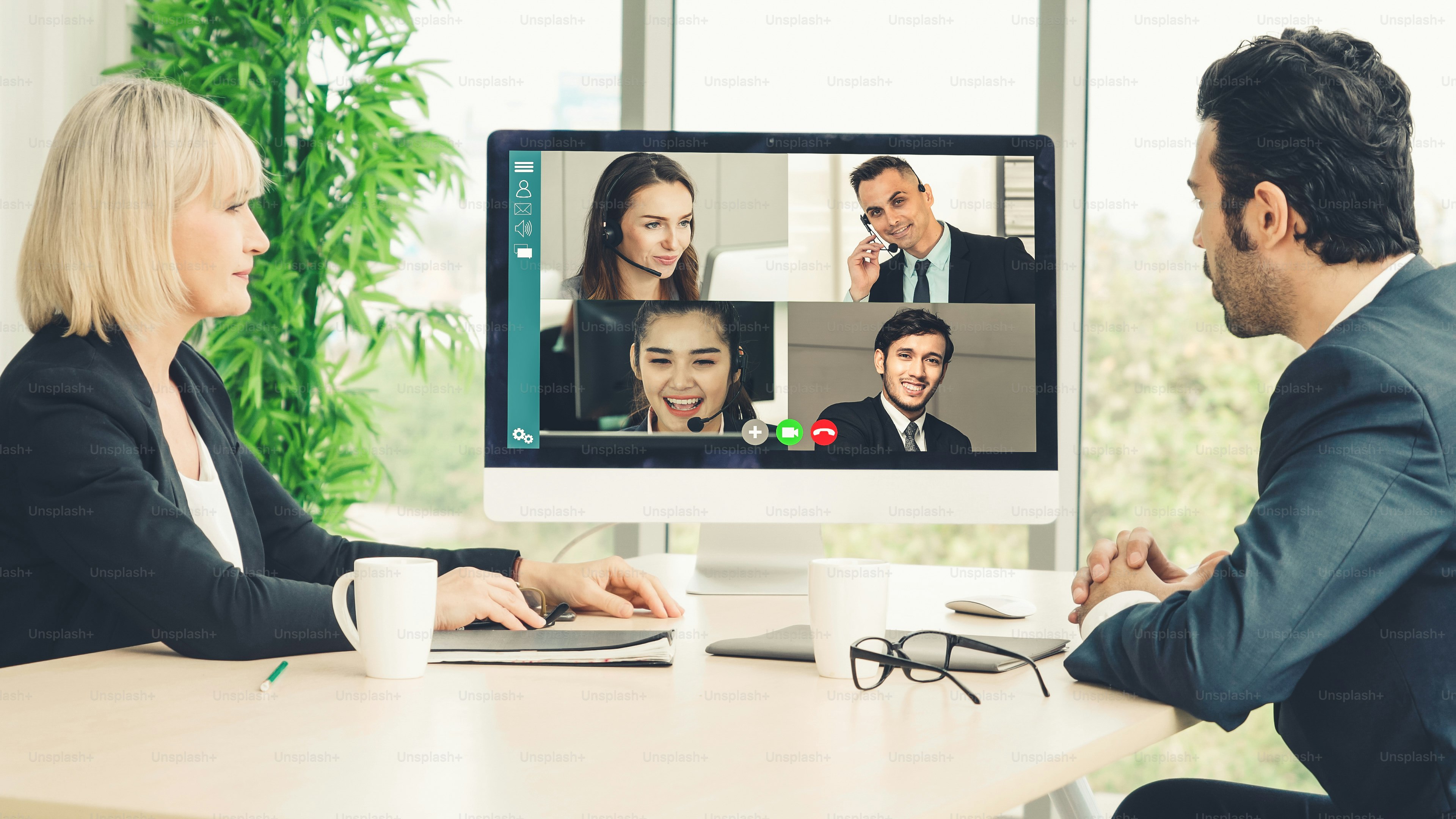 Video call group business people meeting on virtual workplace or remote office. Telework conference call using smart video technology to communicate colleague in professional corporate business.