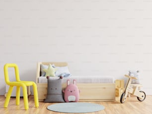 Maqueta de la pared en la habitación de los niños en fondo de pared blanca.3d renderizado