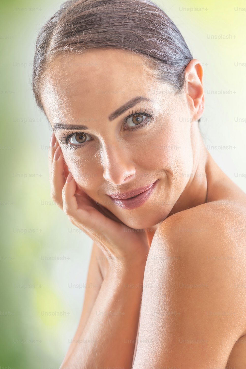 Beautiful face of young adult woman with clean  skin without make-up. Spa skincare wellness and cosmetics concept.