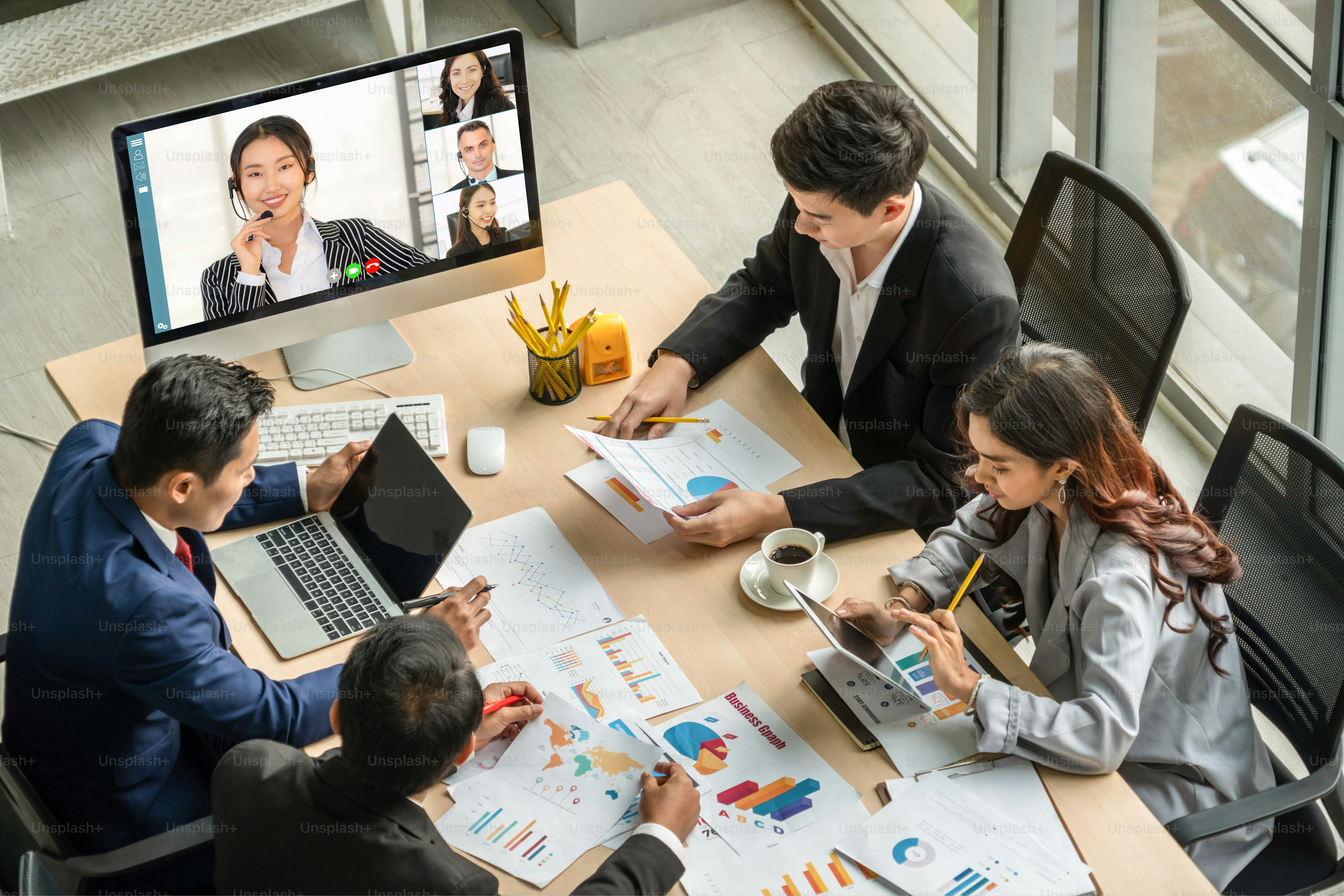 Video call group business people meeting on virtual workplace or remote office. Telework conference call using smart video technology to communicate colleague in professional corporate business.