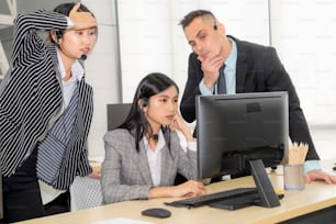 Business people wearing headset feel unhappy working in office . Failure negative sadness emotion concept of call center, telemarketing and customer support crisis in financial economy down fall .