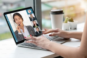 Video call business people meeting on virtual workplace or remote office. Telework conference call using smart video technology to communicate colleague in professional corporate business.