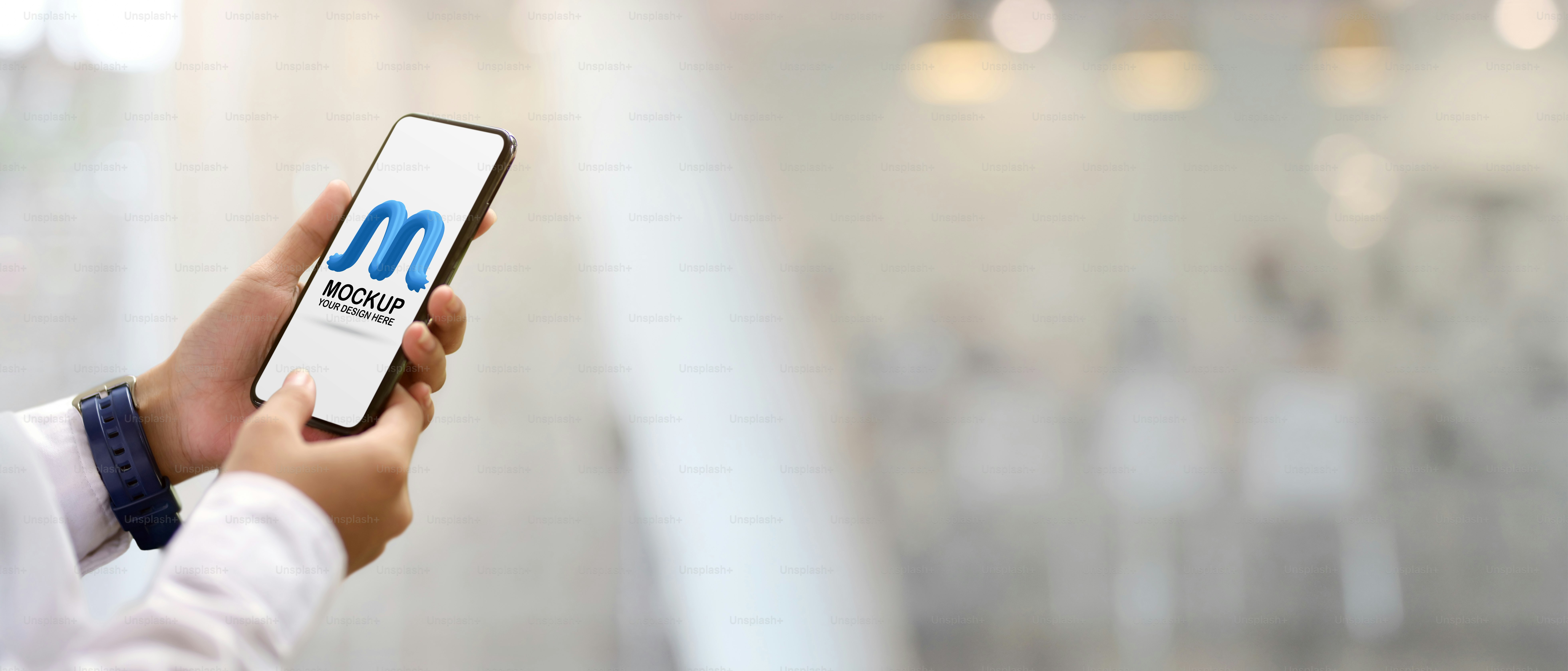 Close up view of female hands holding mock up smartphone on blurred ...