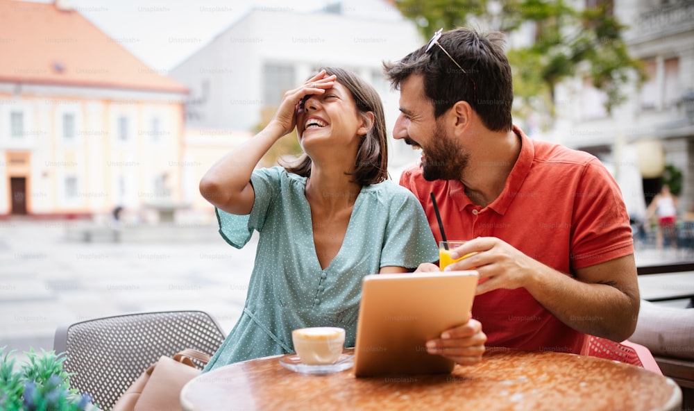 Beautiful couple having fun on a date in a cafe