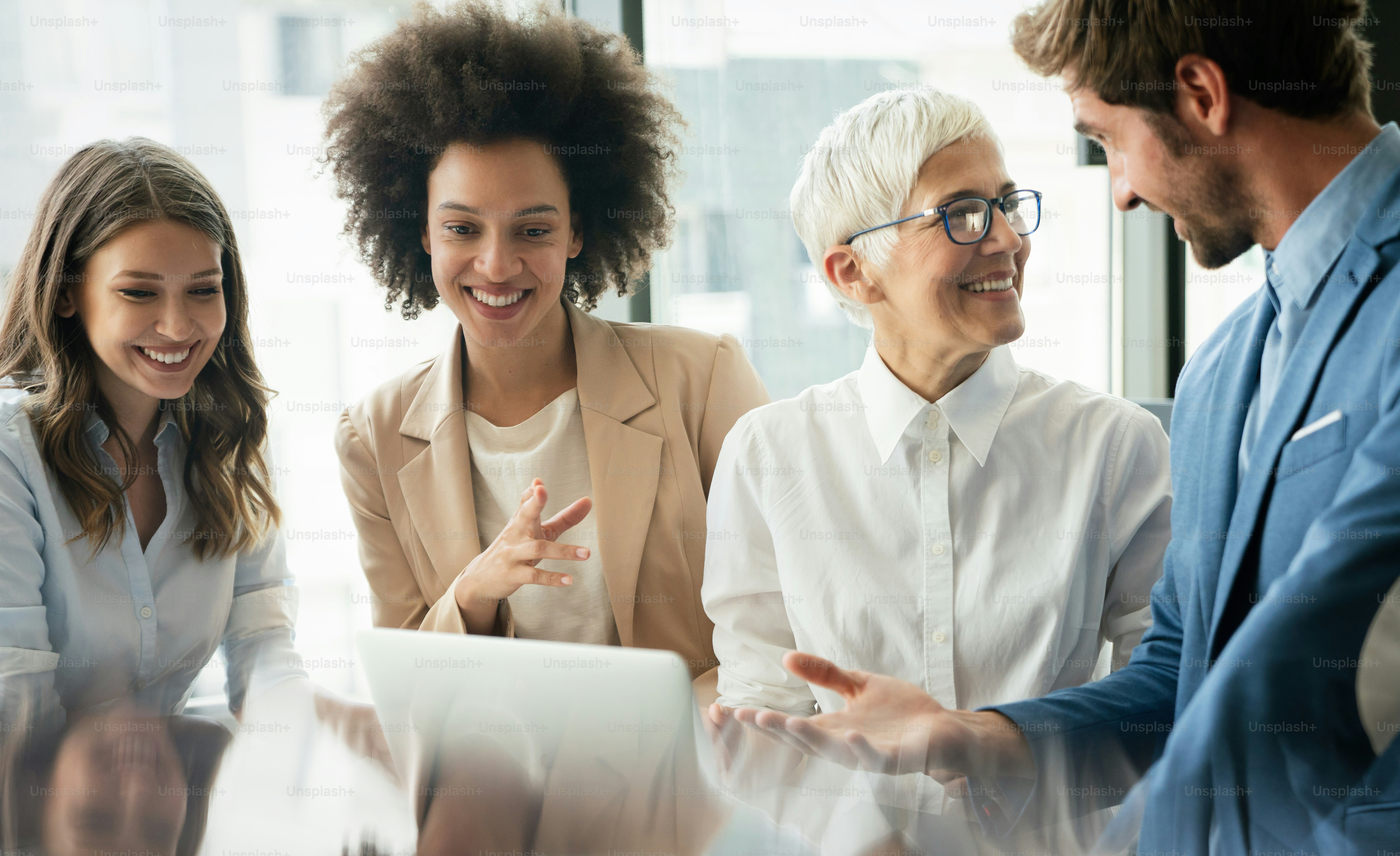 Group of business colleagues in conference meeting room during presentation