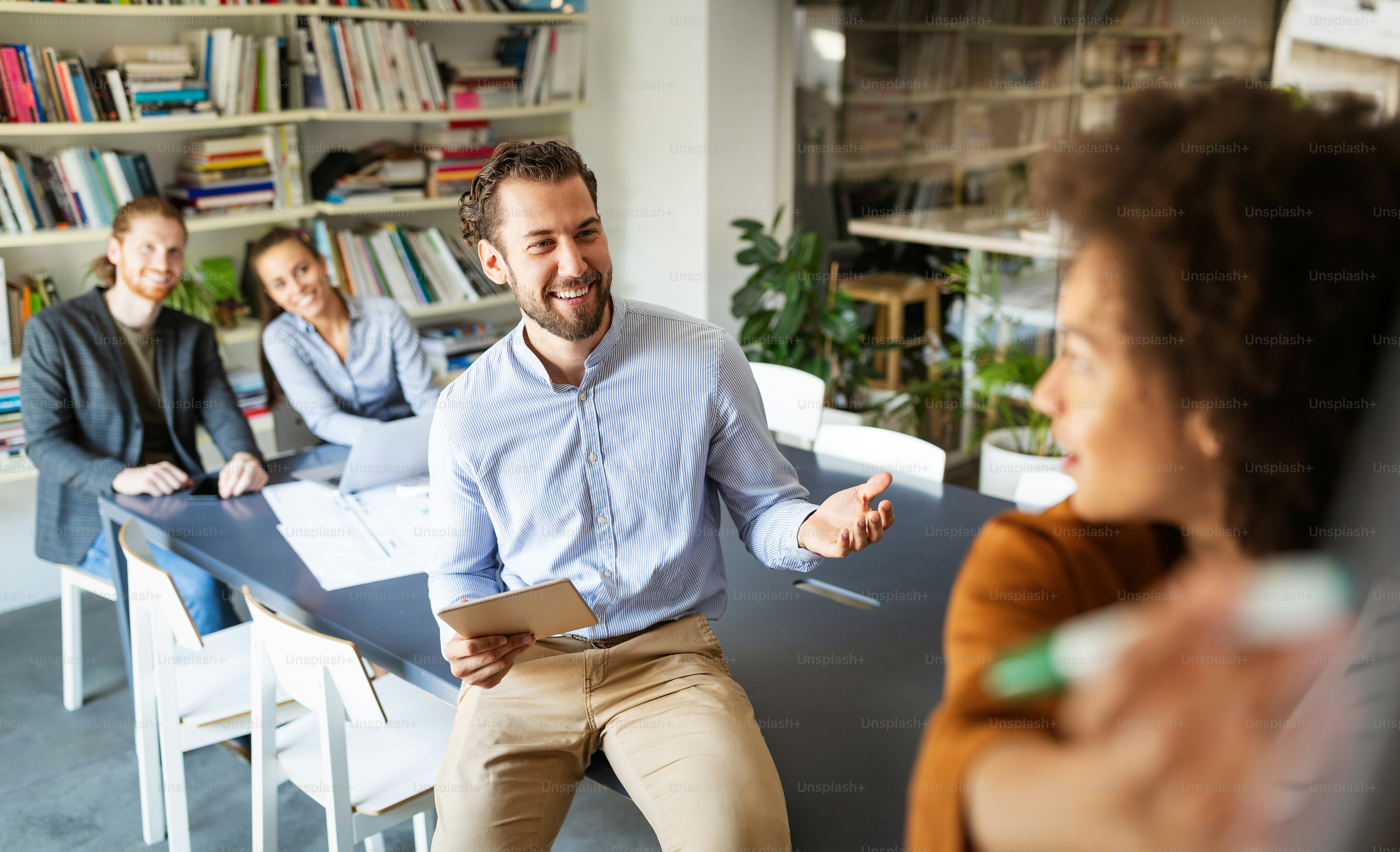 Group of people in a business meeting discussing ideas at the office ...