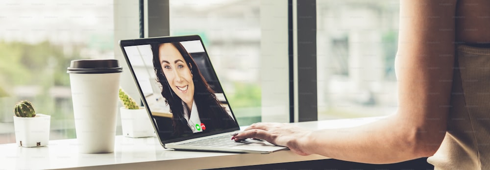 Video call business people meeting on virtual workplace or remote office. Telework conference call using smart video technology to communicate colleague in professional corporate business.