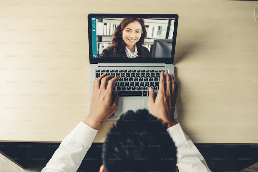 Video call business people meeting on virtual workplace or remote office. Telework conference call using smart video technology to communicate colleague in professional corporate business.