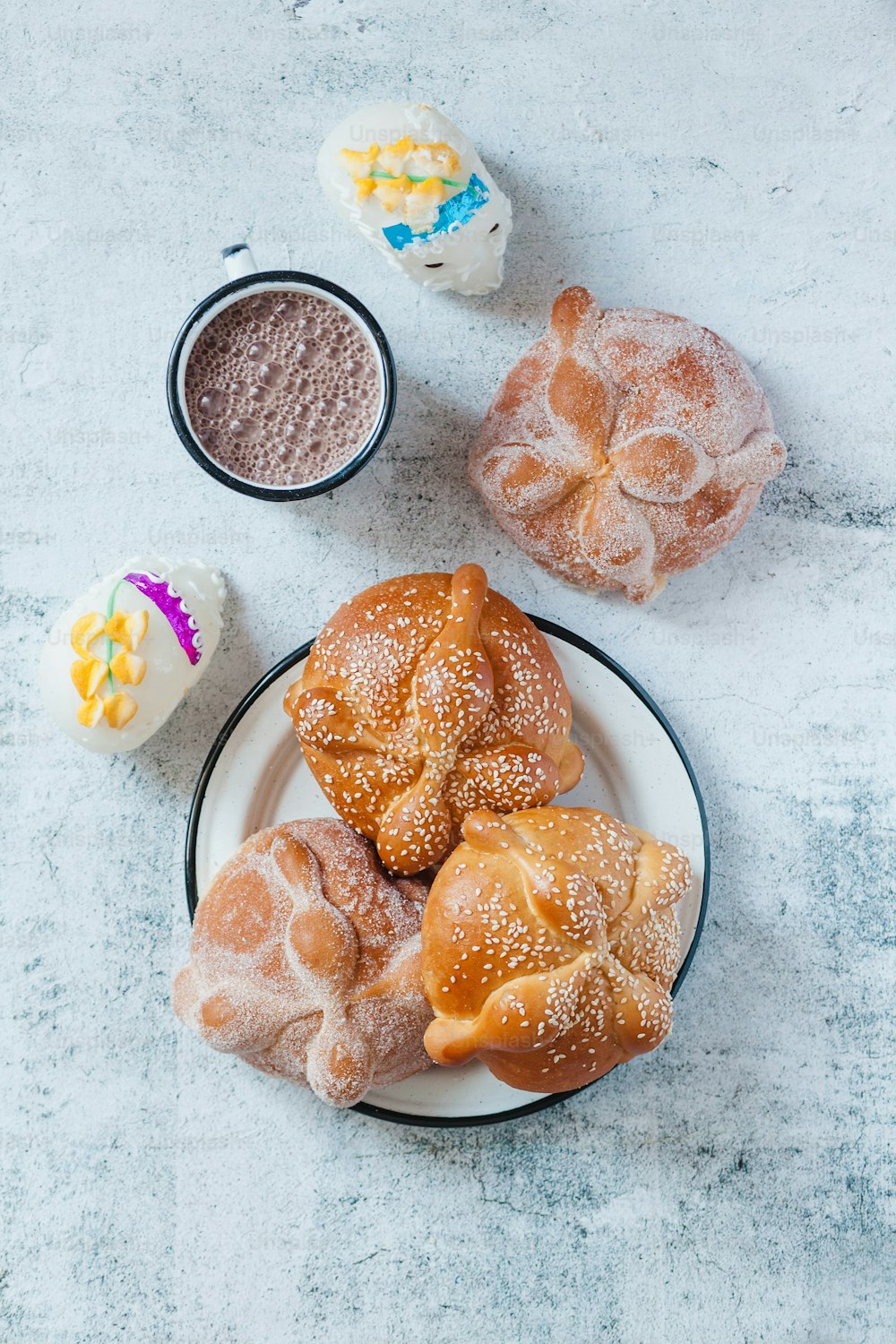 Pan de Muerto and hot chocolate, Mexican bread traditional for day of the Dead in Mexico