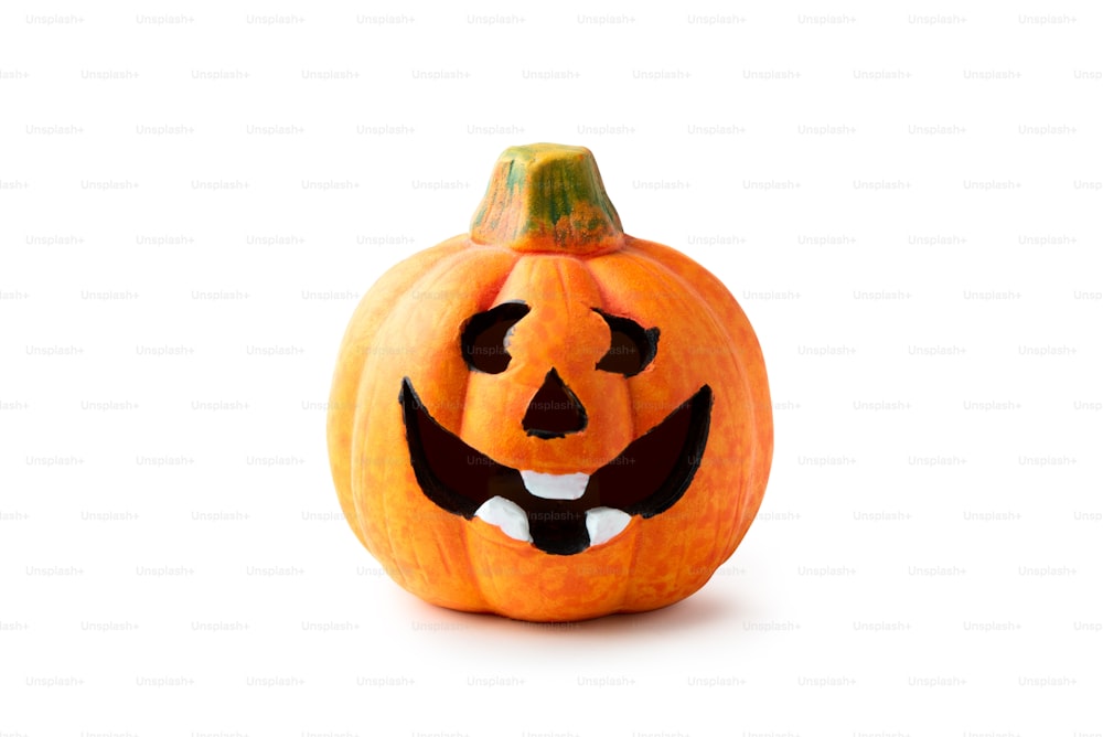 Halloween pumpkin head jack lantern candle isolated on white background. Clipping path