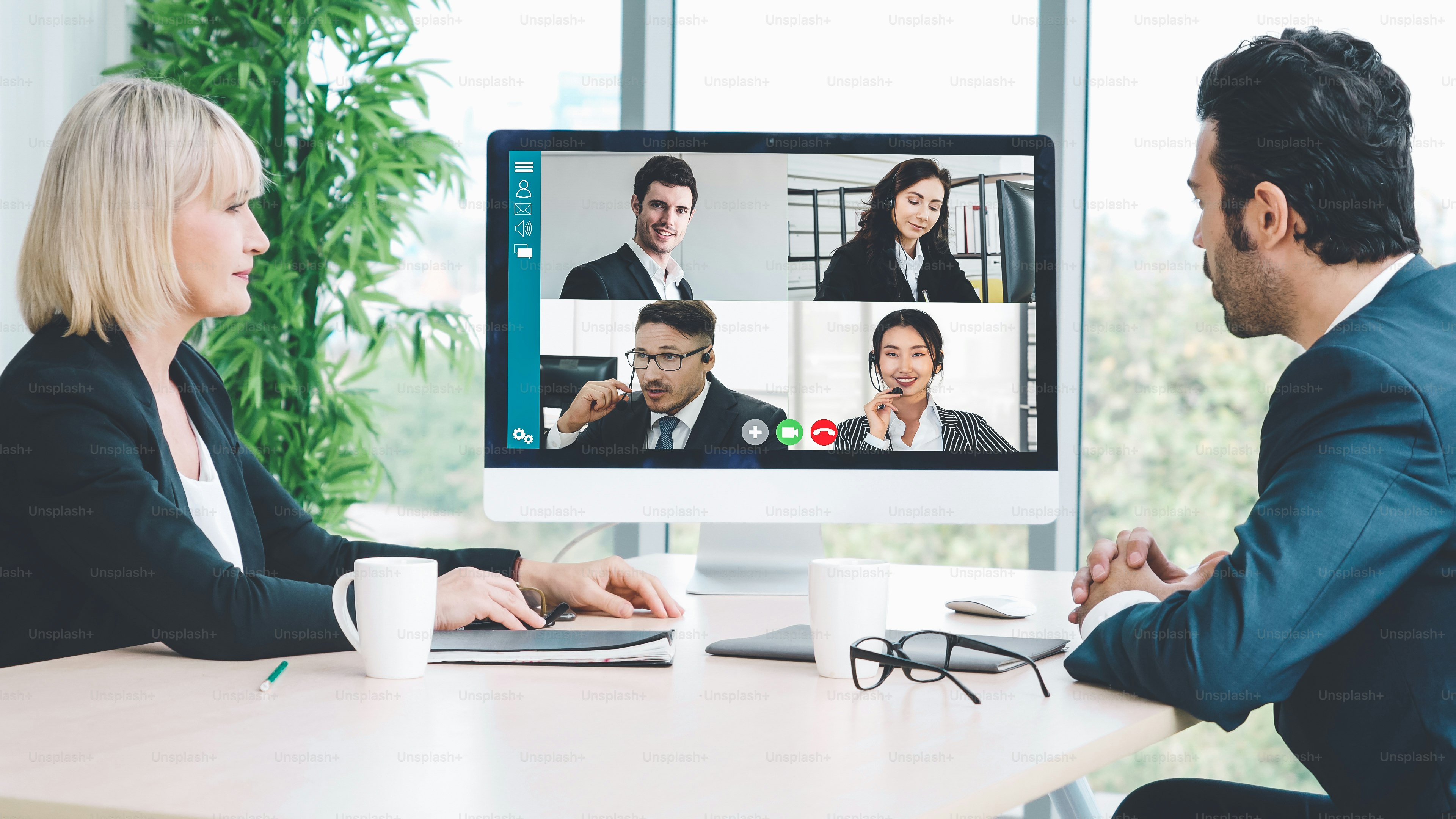 Video call group business people meeting on virtual workplace or remote office. Telework conference call using smart video technology to communicate colleague in professional corporate business.