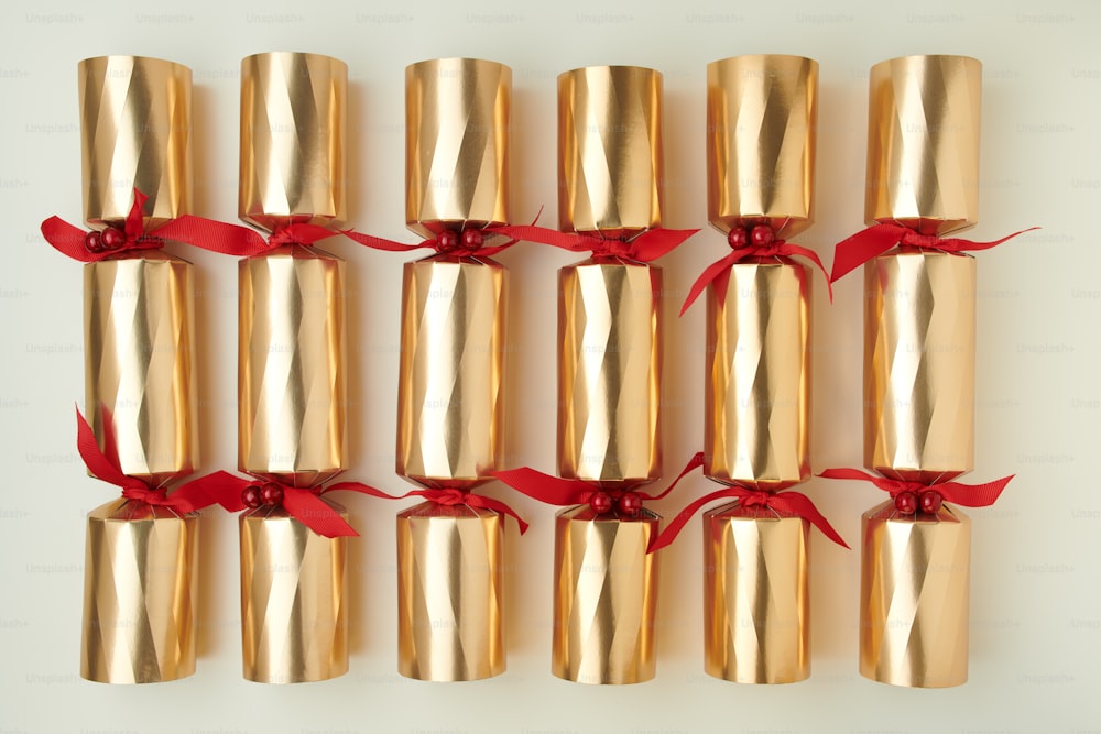Merry Christmas. flat lay with golden Victorian Christmas crackers on white background.