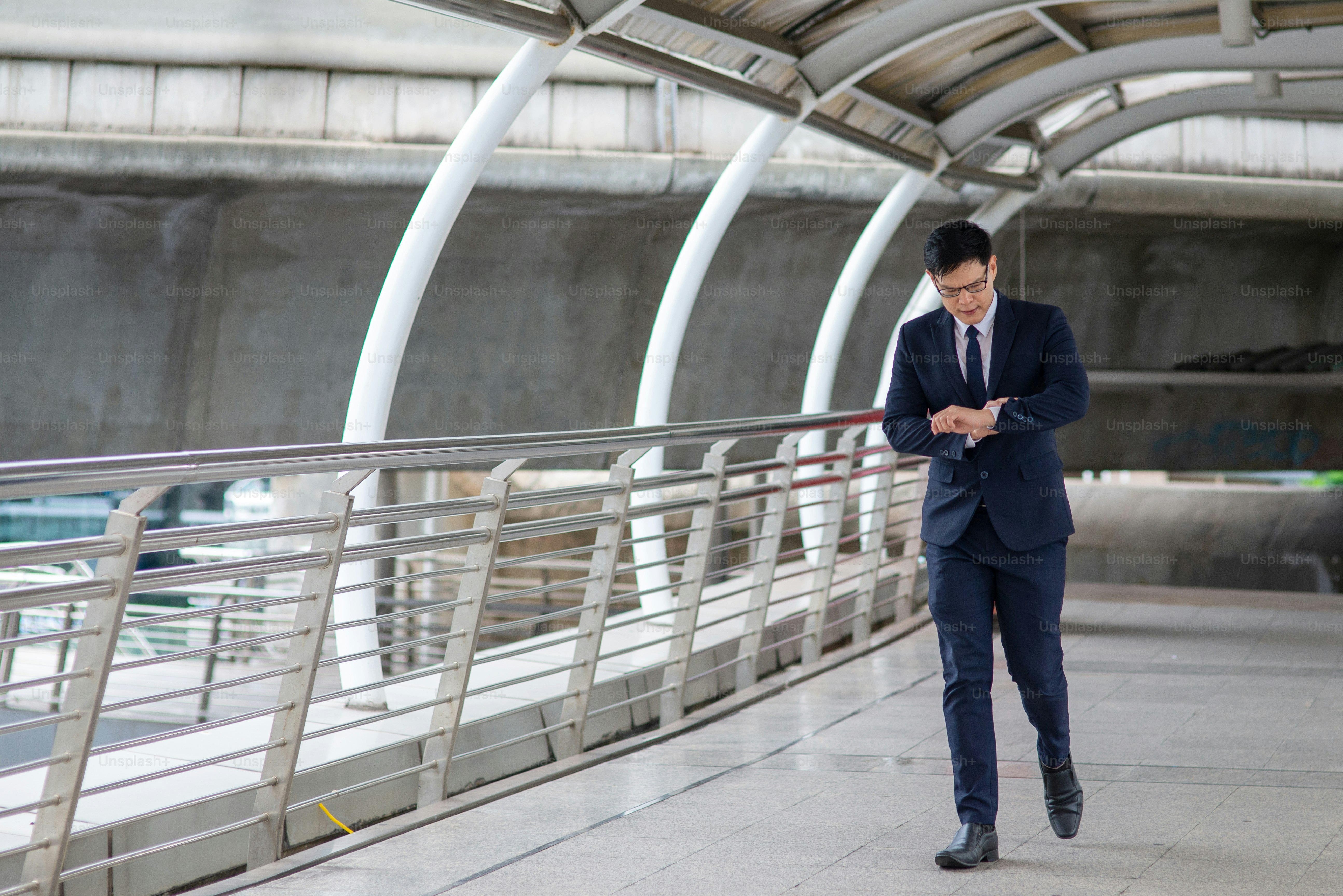 Asian businessman walking in the city.