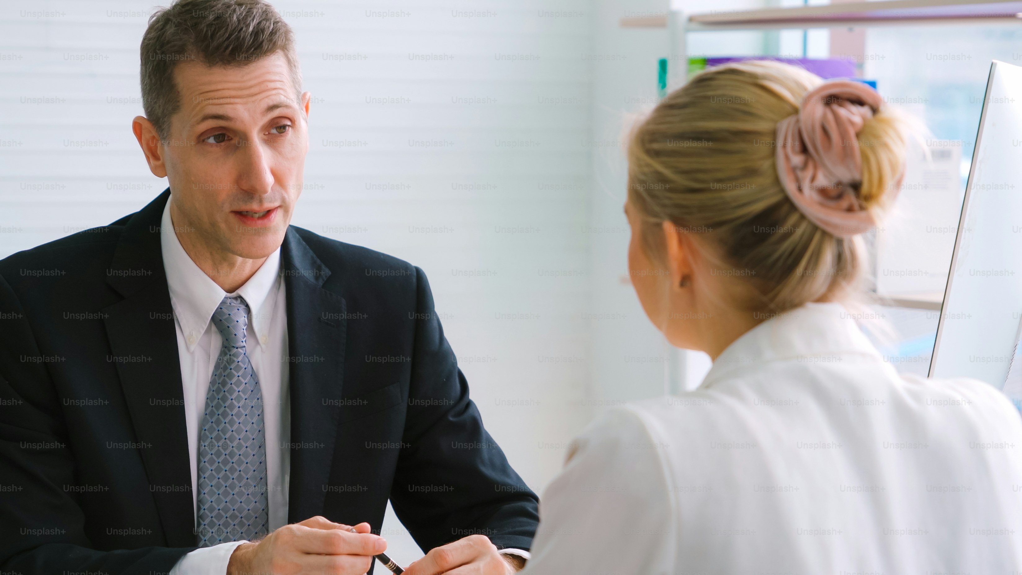 Job seeker in job interview meeting with manager and interviewer at corporate office. The young interviewee seeking for a professional career job opportunity . Human resources and recruitment concept.