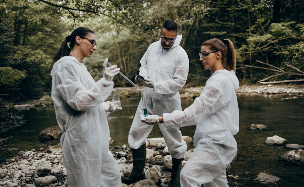 Team of scientists and biologists researching possibilities for bacteria and virus spreading through natural flowing supplies of drinking water.