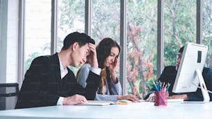 Angry business person dispute work problem in group meeting at office . Business bankrupt failure and loss concept .