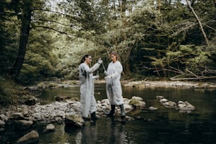 Team of scientists and biologists researching possibilities for bacteria and virus spreading through natural flowing supplies of drinking water.