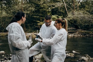 Team of scientists and biologists researching possibilities for bacteria and virus spreading through natural flowing supplies of drinking water.