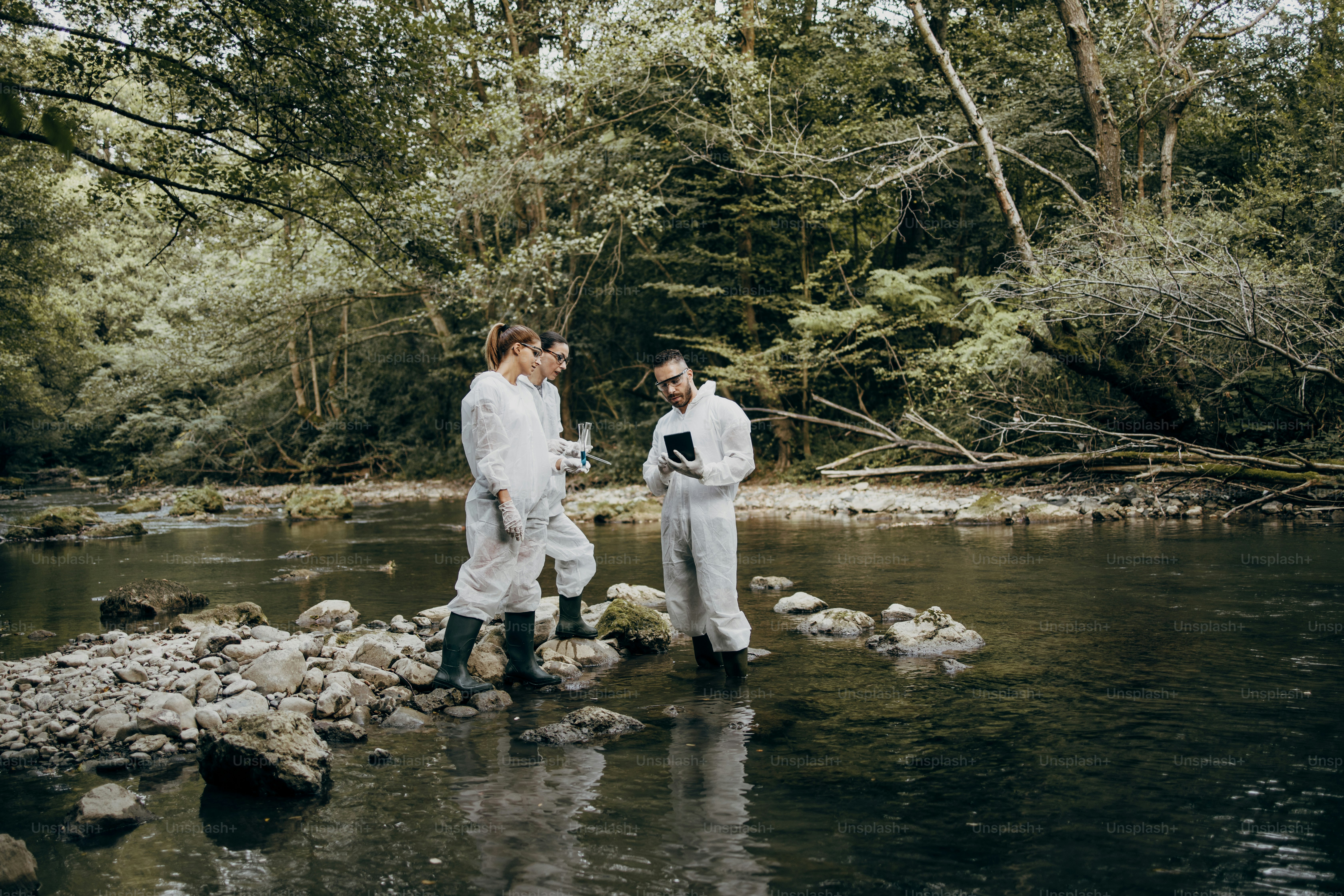 Team of scientists and biologists researching possibilities for bacteria and virus spreading through natural flowing supplies of drinking water.