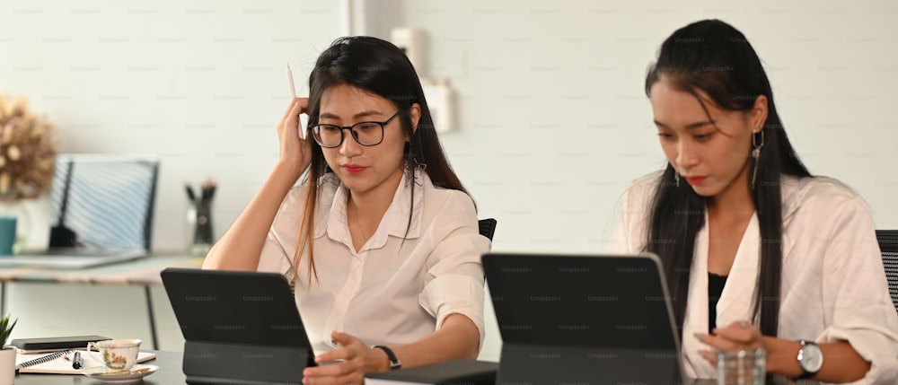 Business people are working on their computers laptop in modern office.