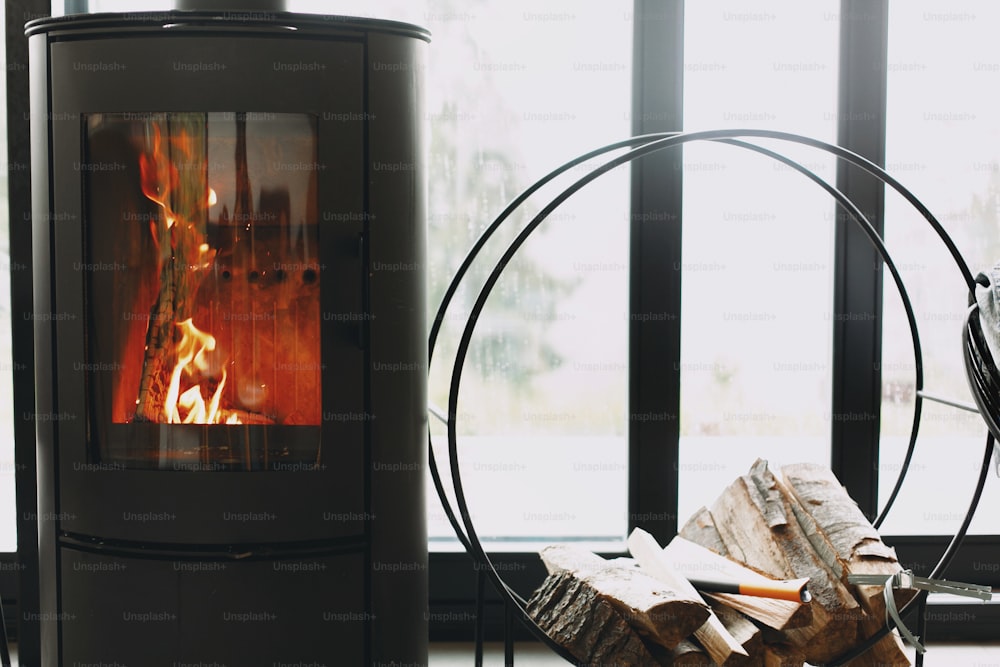 Cozy Fireplace With A Wood Burning Stove Stock Photo - Download Image Now -  Wood Burning Stove, Fireplace, Wood - Material - iStock