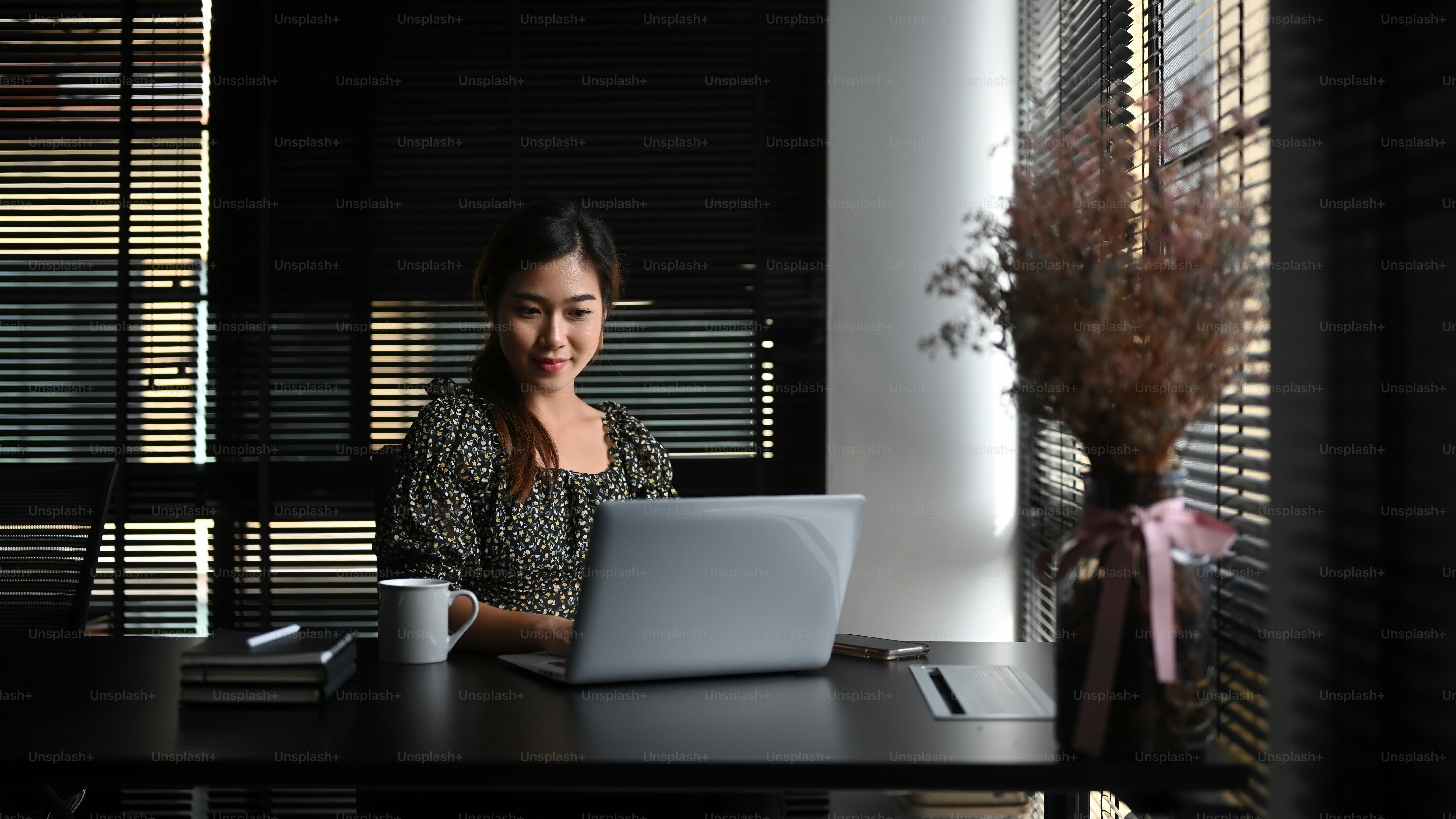 Young beautiful freelancer woman using laptop computer working online.