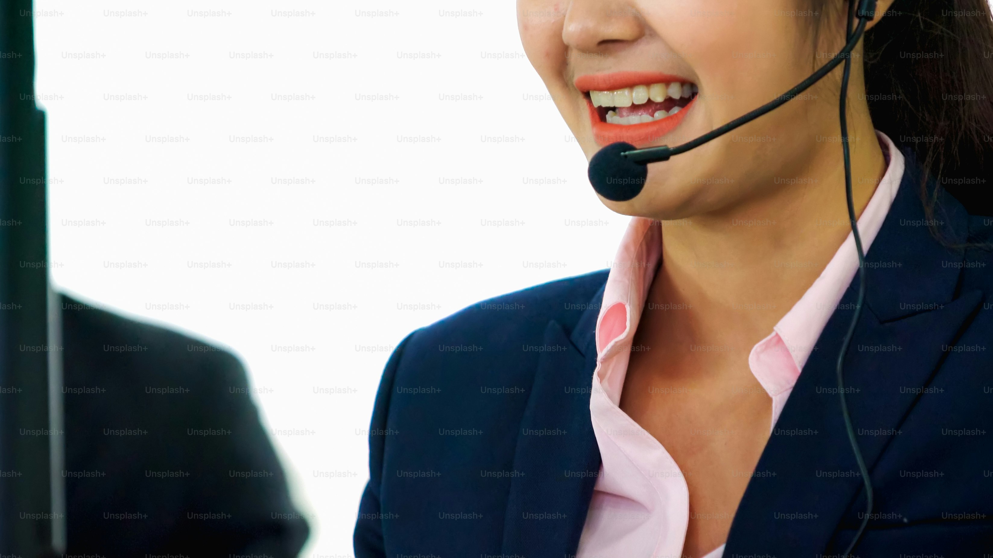Business people wearing headset working in office to support remote customer or colleague. Call center, telemarketing, customer support agent provide service on telephone video conference call.