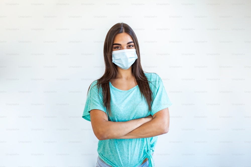 Portrait of young woman wearing face protective mask to prevent Coronavirus and anti-smog. Portrait of young woman wearing face mask.