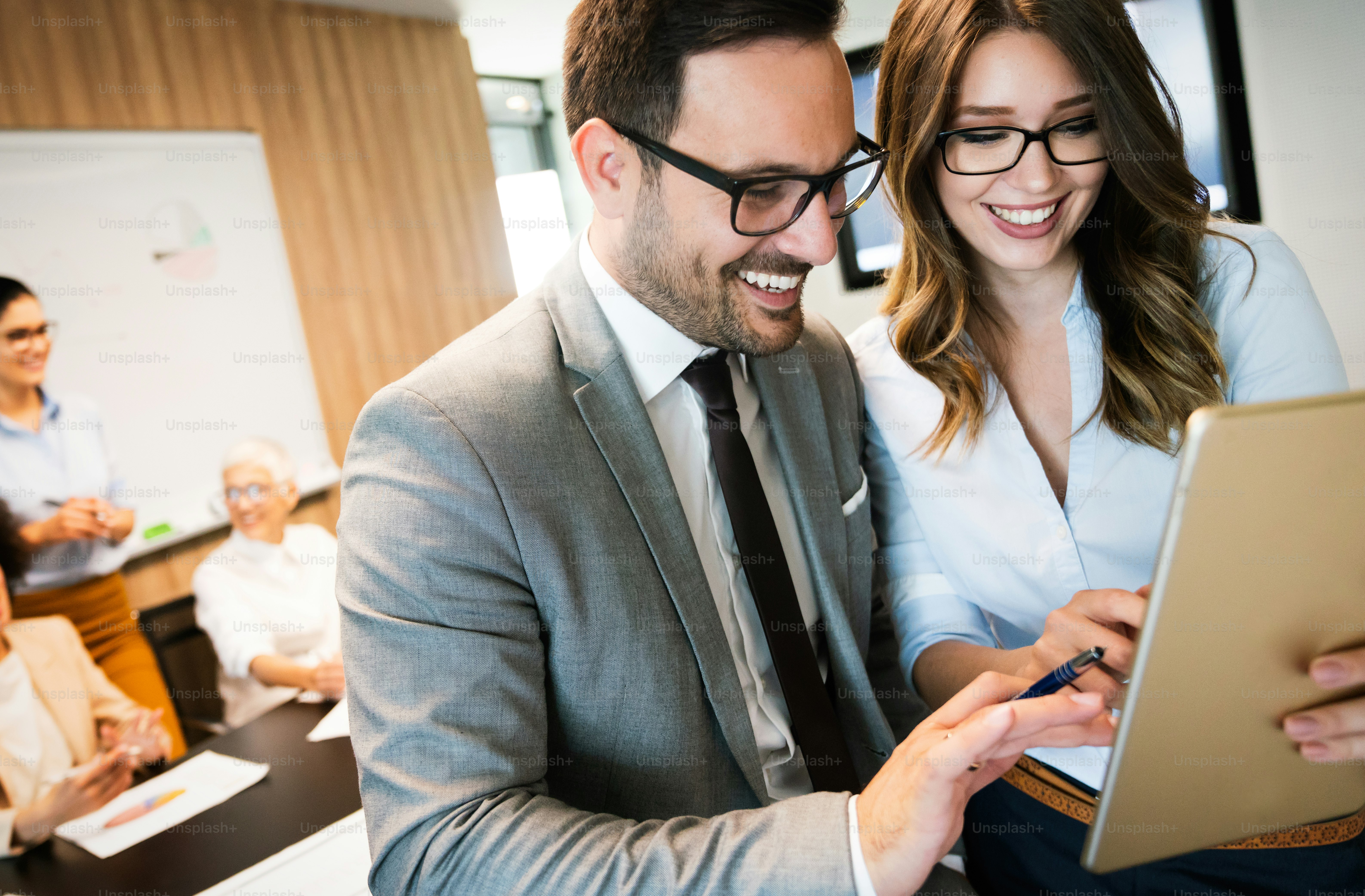 Successful entrepreneurs and business people achieving goals in office