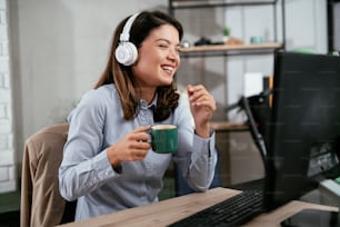 Businesswoman is having a video call on computer. Beautiful woman having meeting online.