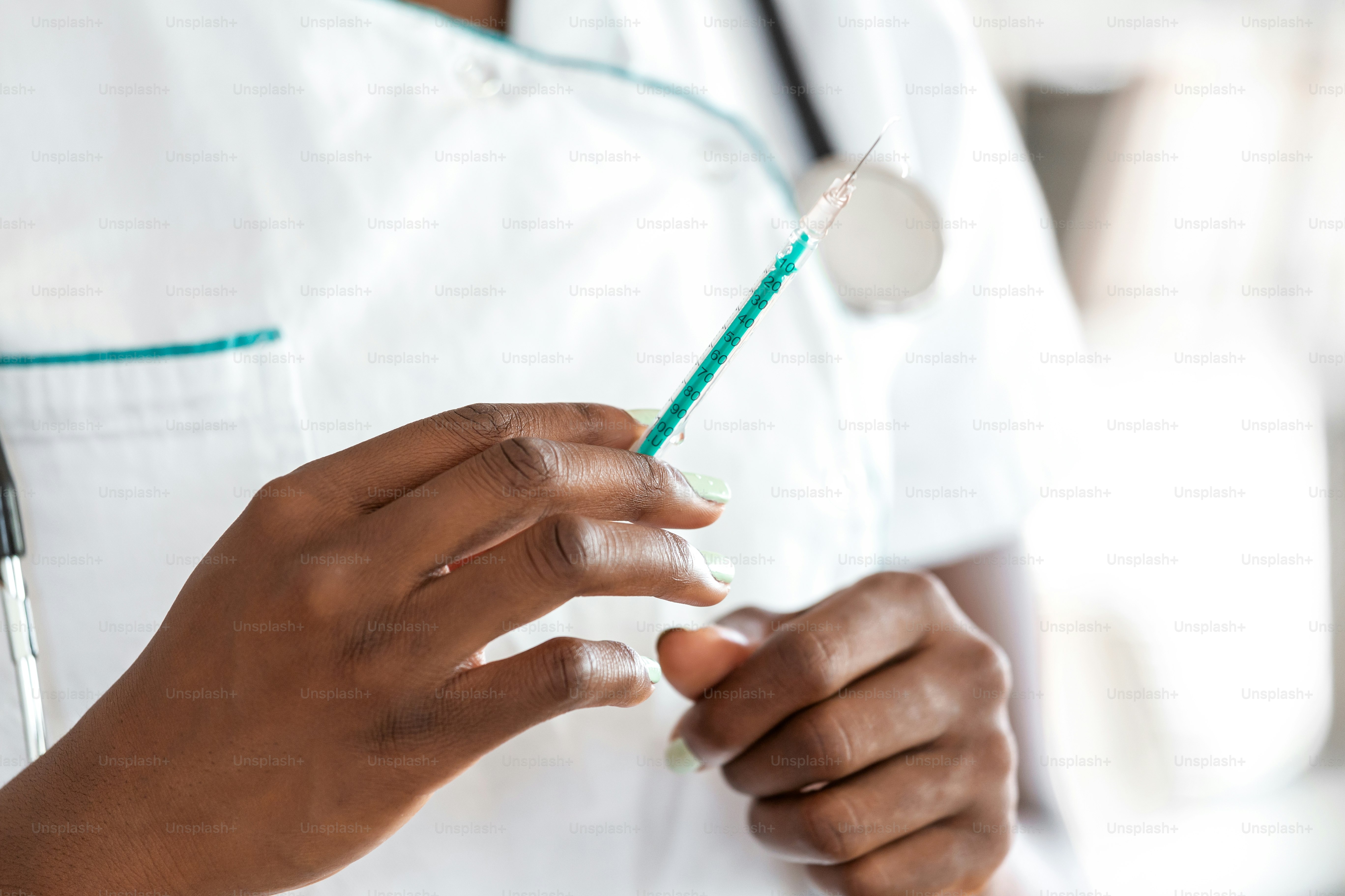 Syringe, medical injection in hand, palm or fingers. Medicine plastic vaccination equipment with needle. Nurse or doctor. Liquid drug or narcotic. Health care in hospital.