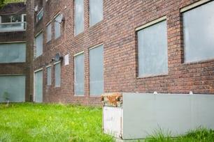 A damaged refrigerator abandoned at disused part of the Grahame Park housing Estate in North London