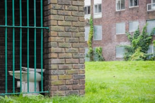 A damaged toilet bowl left at disused council blocks in Grahame park housing estate in north London