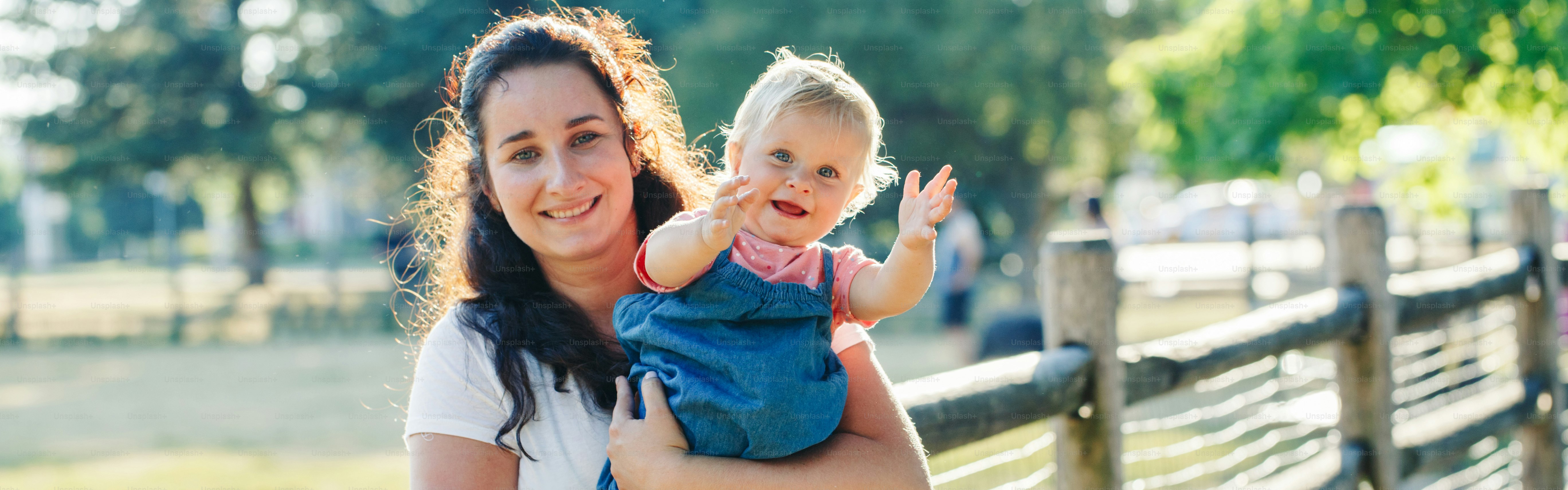Mother hugging pacifying sad upset crying toddler girl. Family young ...