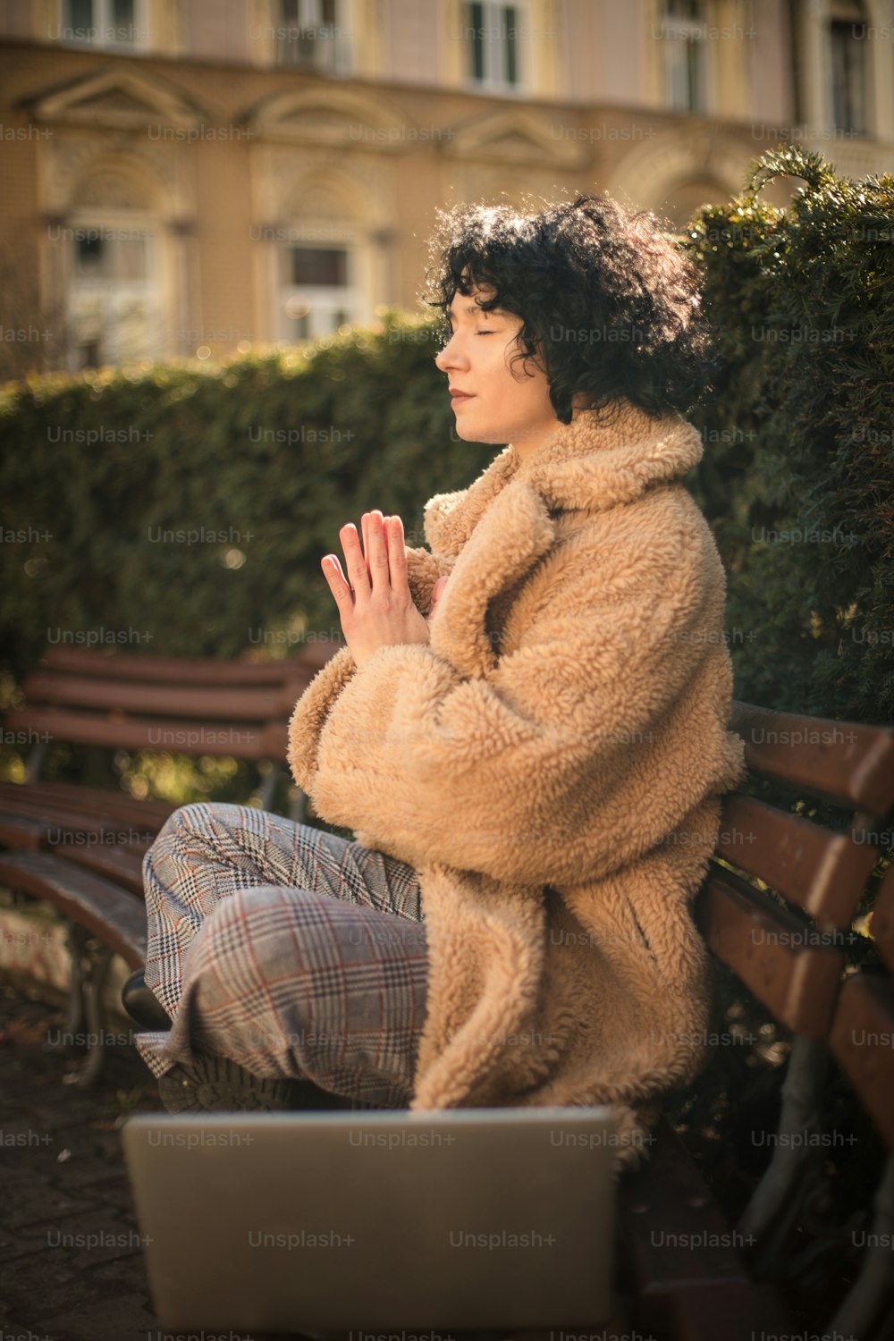 Woman in the city park working yoga.