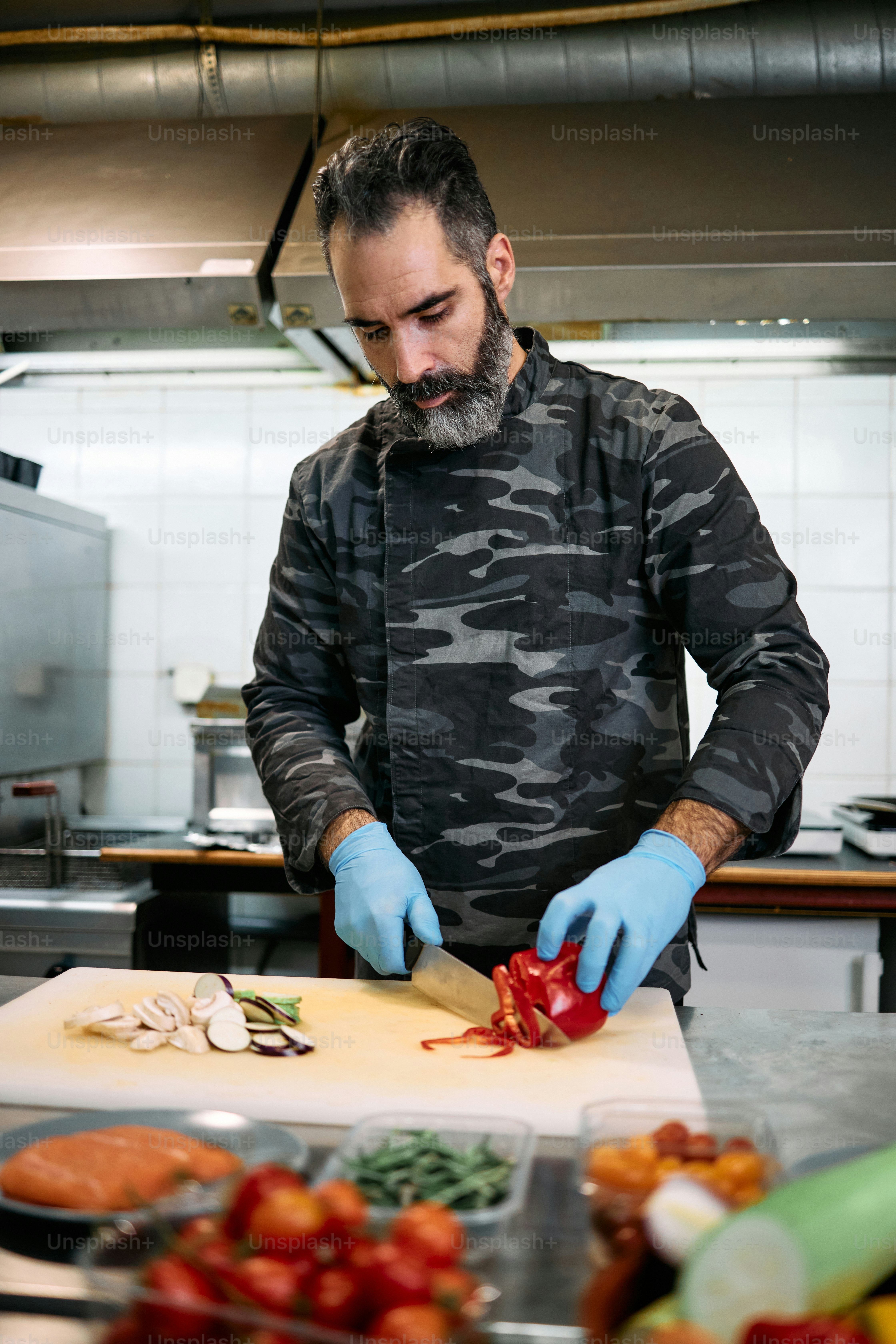 Professional military base chef or cook holds delicious tasty meal with ...