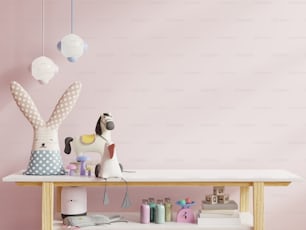Mock up wall in the children's room in light pink color wall background .3d rendering