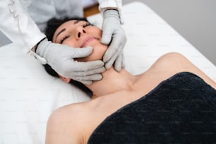 Micro sensory electrical BIO EMS microcurrent treatment for face and body electro stimulation and muscle toning. Anti wrinkle and anti-aging lifting. Alternative therapy with conductive gloves.