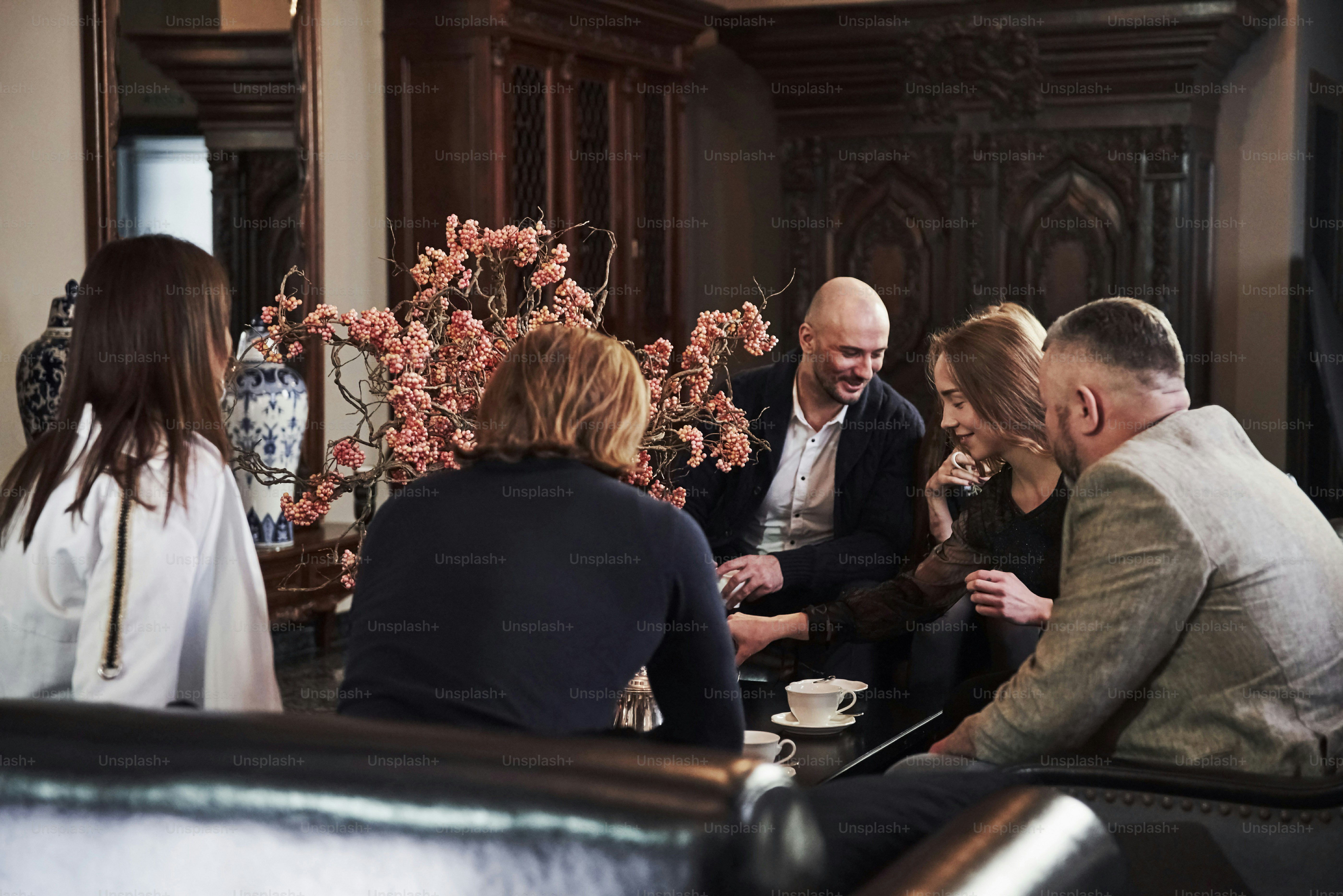 Luxury hotel marketing team reviewing hospitality SEO tools and booking performance data